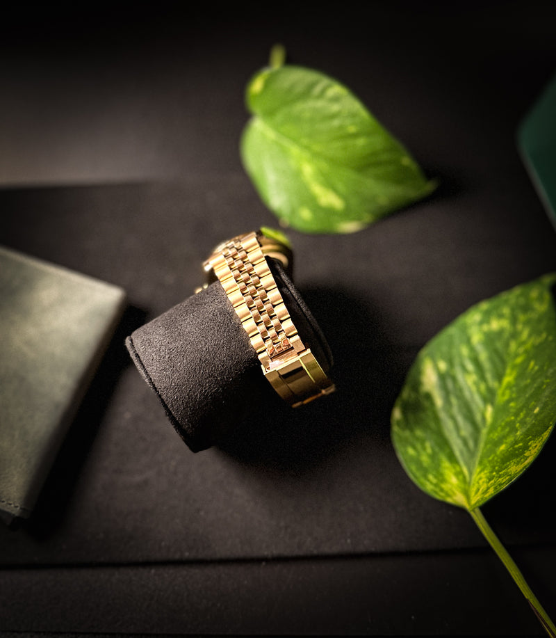 Side angle of the Valenne Destro watch highlighting the polished steel case and draped jubilee-style bracelet.